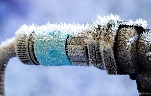 A Sprinkler attachment frosted over in winter