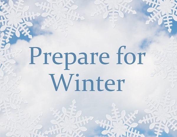 Snowflakes on a cloudy blue background with the words "Prepare for Winter"